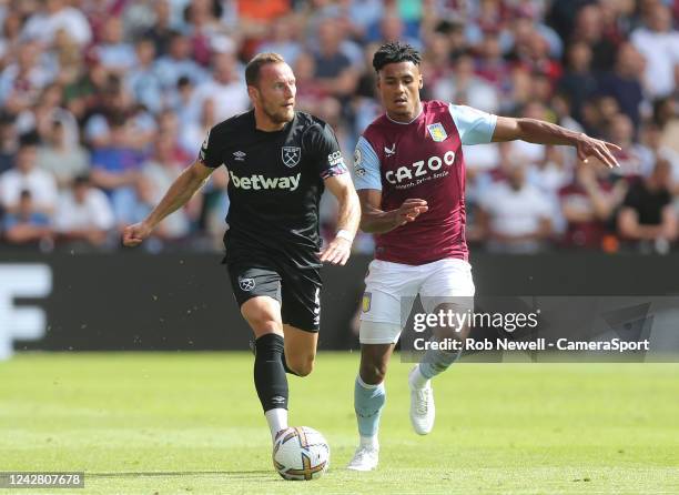 West Ham United's Vladimir Coufal and Aston Villa's Ollie Watkins during the Premier League match between Aston Villa and West Ham United at Villa...