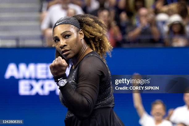 Player Serena Williams reacts after winning a point against Montenegro's Danka Kovinic during their 2022 US Open Tennis tournament women's singles...