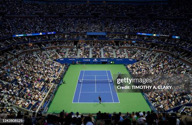 Player Serena Williams serves to Montenegro's Danka Kovinic during their 2022 US Open Tennis tournament women's singles first round match at the USTA...