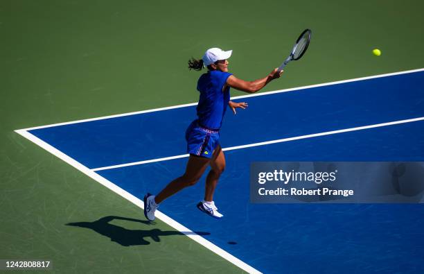 Harmony Tan of France hits a shot against Bianca Andreescu of Canada during her first round match on Day 1 of the US Open Tennis Championships at...