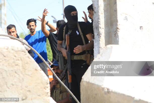 Supporters of Iraqi cleric Muqtada al-Sadr clash with security forces with heavy weapons at Green Zone after Sadr supporters stormed the Presidential...