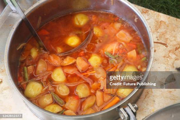 Borscht with apples cooked by a TV presenter of "Snidanok 1+1" Kostya Hrubych in the "Victory" field kitchen together with military personnel and...