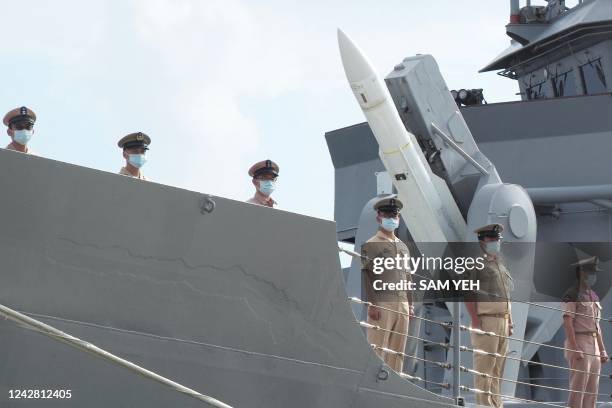 Navy soldiers standby in front of US-made Standard I missile on a frigate as President Tsai Ing-wen inspects military troops on Penghu islands on...