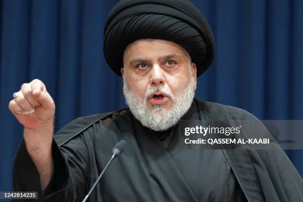 Shiite Muslim cleric Moqtada Sadr gives a speech in Iraq's central holy shrine city of Najaf on August 30, 2022. - Iraqi supporters of powerful...