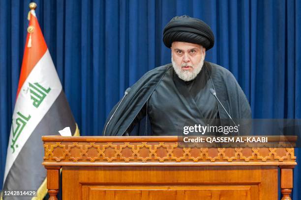 Shiite Muslim cleric Moqtada Sadr gives a speech in Iraq's central holy shrine city of Najaf on August 30, 2022. - Iraqi supporters of powerful...