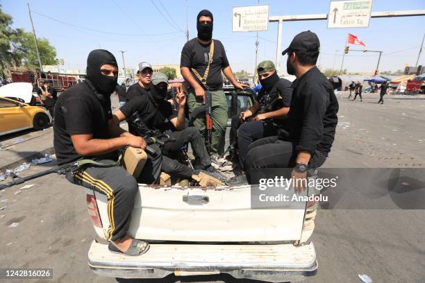 Supporters of Iraq's Shia cleric Muqtada al-Sadr begin to withdraw from the fortified Green Zone after al-Sadr's call for withdrawal in Baghdad, Iraq...