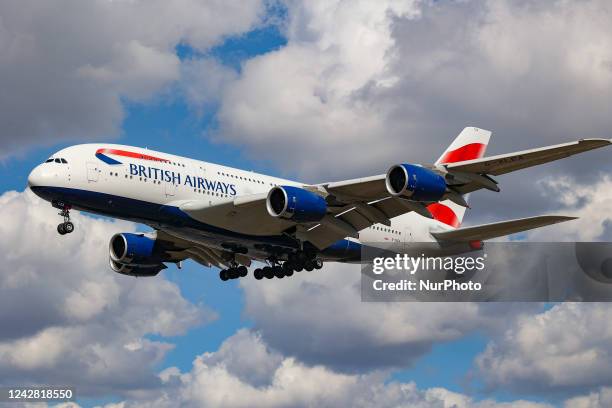 British Airways Airbus A380 airplane as seen on final approach flying over the houses in Myrtle Avenue, arriving for landing in London Heathrow...