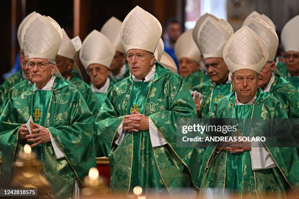 Newly elevated Cardinals, Monsignor Leonardo Ulrich Steiner, Monsignor Robert Walter McElroy, and Monsignor Oscar Cantoni attend a Pope's mass with...