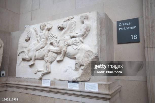 People admire the Parthenon Marbles inside the Parthenon Galleries in the British Museum. The marbles are also known as Elgin Marbles, with...