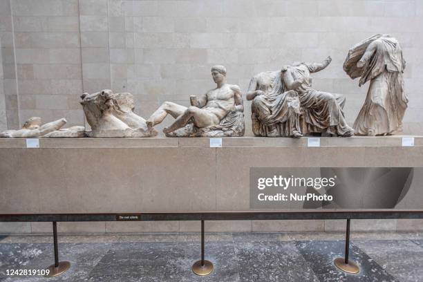 People admire the Parthenon Marbles inside the Parthenon Galleries in the British Museum. The marbles are also known as Elgin Marbles, with...