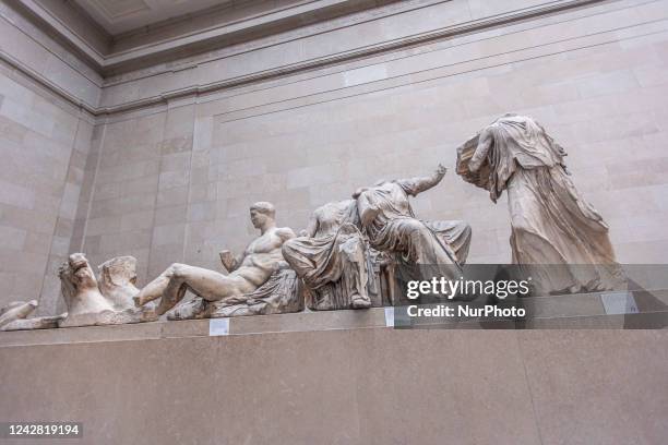 People admire the Parthenon Marbles inside the Parthenon Galleries in the British Museum. The marbles are also known as Elgin Marbles, with...