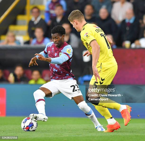 Burnley's Nathan Tella battles with Millwall's Charlie Cresswell during the Sky Bet Championship between Burnley and Millwall at Turf Moor on August...