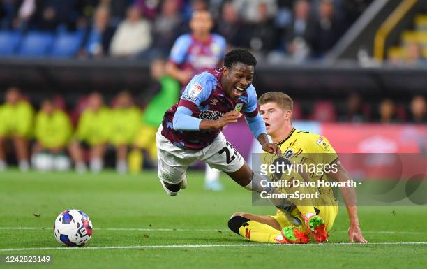 Burnley's Nathan Tella is fouled by Millwall's Charlie Cresswell during the Sky Bet Championship between Burnley and Millwall at Turf Moor on August...