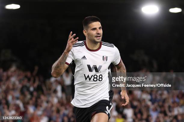 Aleksandar Mitrovic of Fulham celebrates after scoring their first goal during the Premier League match between Fulham FC and Brighton & Hove Albion...