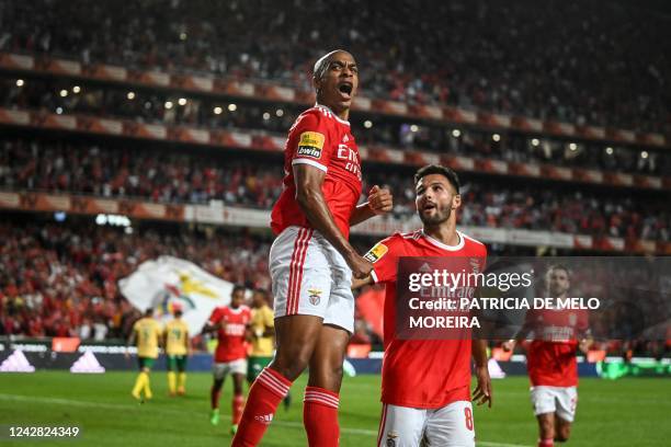 Benfica's Portuguese midfielder Joao Mario celebrates after scoring his team's second goal during the Portugues League football match between SL...