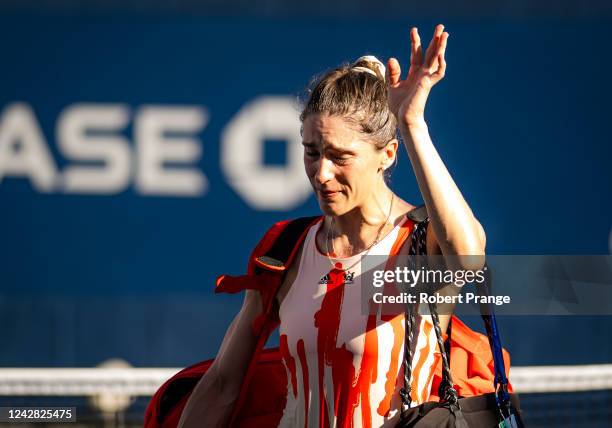 Andrea Petkovic of Germany walks off the court after losing to Belinda Bencic of Switzerland in her last career match on Day 2 of the US Open Tennis...