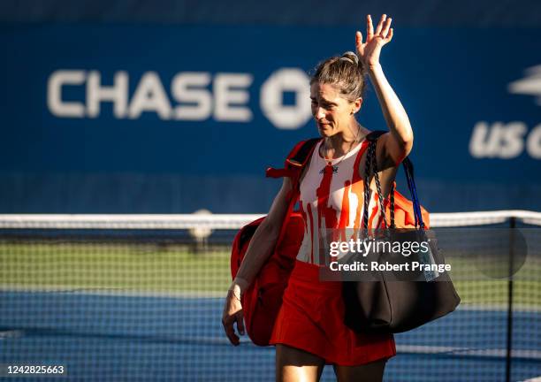 Andrea Petkovic of Germany walks off the court after losing to Belinda Bencic of Switzerland in her last career match on Day 2 of the US Open Tennis...