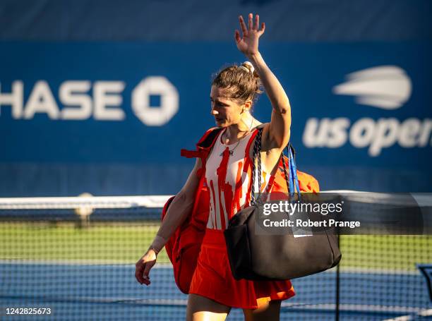 Andrea Petkovic of Germany walks off the court after losing to Belinda Bencic of Switzerland in her last career match on Day 2 of the US Open Tennis...