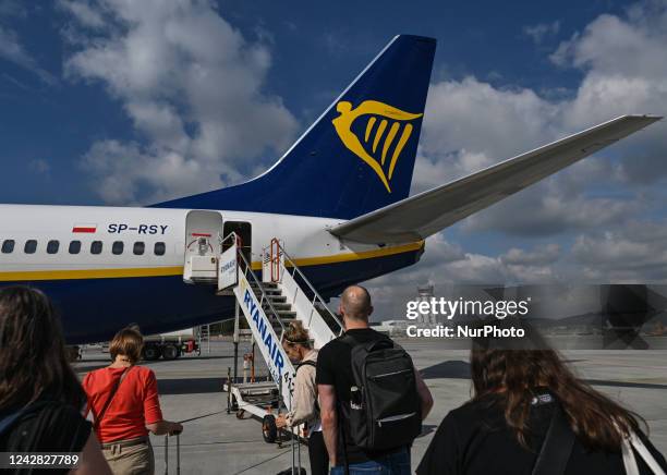 Ryanair plane boarding at John Paul II Krakow-Balice International Airport. On Tuesday, August 30 in John Paul II Krakow-Balice International...