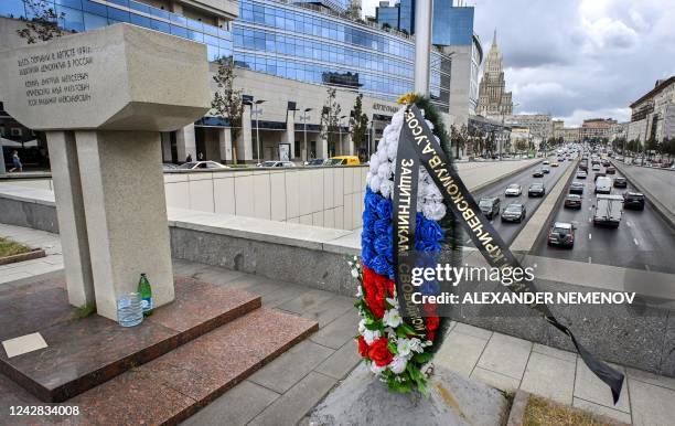 Black ribbon waves on a wreath at the monument to the victims of the 1991 failed against then Soviet leader Mikhail Gorbachev, in central Moscow, on...