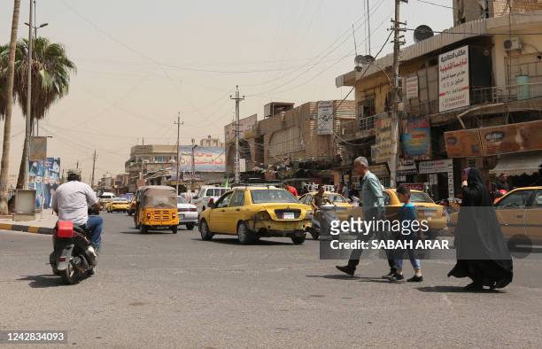 This picture taken on August 31, 2022 shows a street in the Iraqi capital Baghdad as calm returns after around 24 hours of deadly violence in Iraq. -...