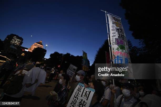 Anti government protesters and supporters of opposition party hold a rally in front of the Parliament in Tokyo, Japan, on August 31 as the Prime...
