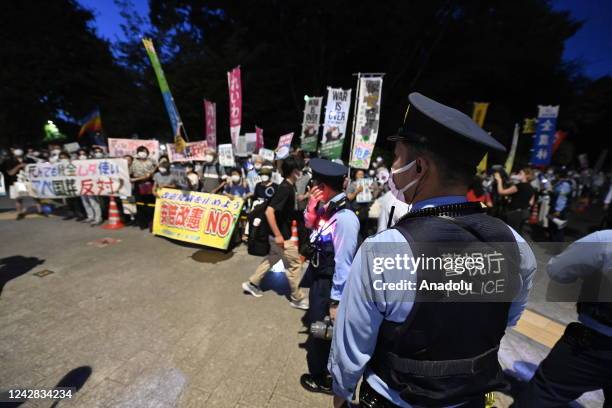 Anti government protesters and supporters of opposition party hold a rally in front of the Parliament in Tokyo, Japan, on August 31 as the Prime...