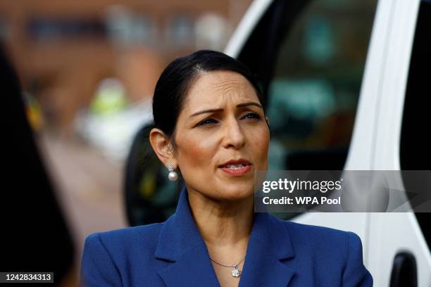 British Home Secretary Priti Patel looks on during a visit with members of the Thames Valley Police, at Milton Keynes Police Station on August 31,...