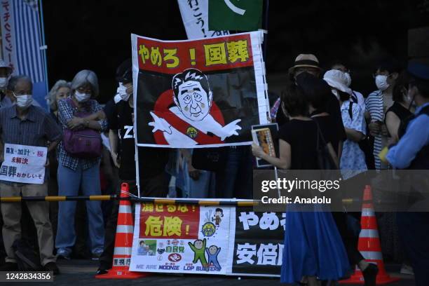 Anti government protesters and supporters of opposition party hold a rally in front of the Parliament in Tokyo, Japan, on August 31 as the Prime...