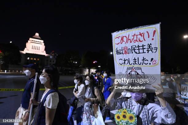 Anti government protesters and supporters of opposition party hold a rally in front of the Parliament in Tokyo, Japan, on August 31 as the Prime...