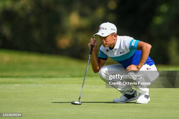 Kohei Okada of Japan lines before plays his third shot on the 12th hole during Day One of the 2022 World Amateur Team Golf Championships - Eisenhower...