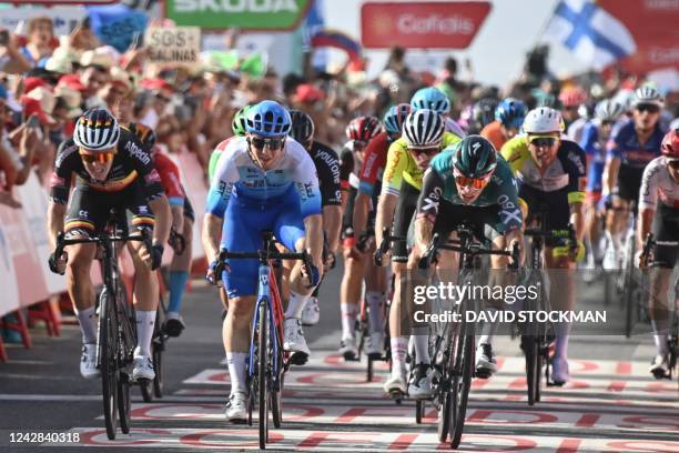 Belgian Tim Merlier of Alpecin-Fenix, Australian Kaden Groves of BikeExchange-Jayco and Dutch Danny van Poppel of Bora-Hansgrohe sprint to the finish...