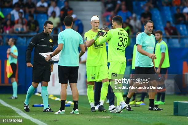 Jonas OMLIN of Montpellier and Matis CARVALHO of Montpellier during the Ligue 1 match between Montpellier and Ajaccio at Stade de la Mosson on August...