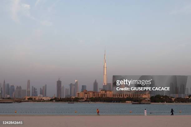 Skyline picture shows downtown Dubai and the Gulf emirate's Burj Khalifa, the worlds tallest building, on August 31, 2022.