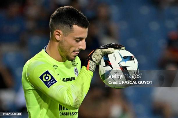 Montpellier's French goalkeeper Matis Carvalho reacts during the French L1 football match between Montpellier Herault SC and AC Ajaccio at Stade de...
