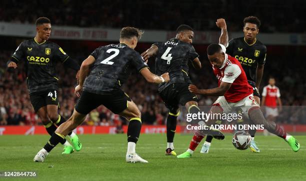 Arsenal's Brazilian striker Gabriel Jesus is closed down by the Villa defence during the English Premier League football match between Arsenal and...