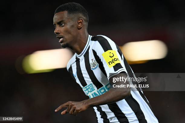 Newcastle United's Swedish striker Alexander Isak chases the ball during the English Premier League football match between Liverpool and Newcastle...