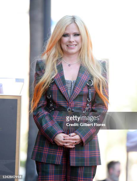 Avril Lavigne at the star ceremony where Avril Lavigne is honored with a star on the Hollywood Walk of Fame on August 31, 2022 in Los Angeles,...
