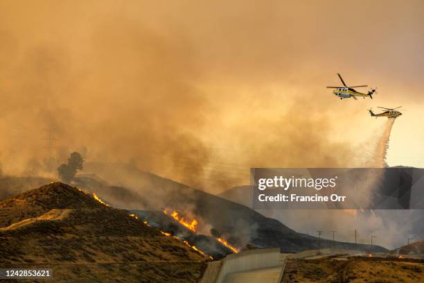 Castaic, CA Helicopters fill with water at the Castaic Lake State Recreation Area on Wednesday, Aug. 31 in Castaic, CA. Amid searing triple-digit...