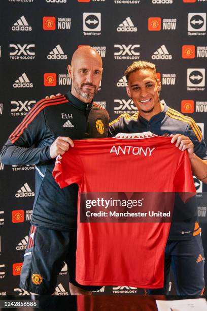 New Manchester United signing Antony poses with Manchester United Head Coach / Manager Erik ten Hag at Carrington Training Ground on September 01,...
