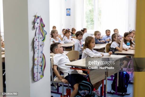 Children attend first lesson in a classroom during the opening day of school year in a famous Black Sea resort of Odessa, Ukraine on September 1,...