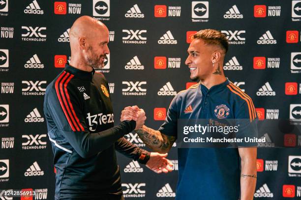 New Manchester United signing Antony is greeted by Manchester United Head Coach / Manager Erik ten Hag at Carrington Training Ground on September 01,...