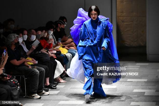 Model displays a creation from the RequaL 2023 S/S Collection by Japanese designer Tetsuya Doi at Tokyo Fashion Week in Tokyo on September 1, 2022.