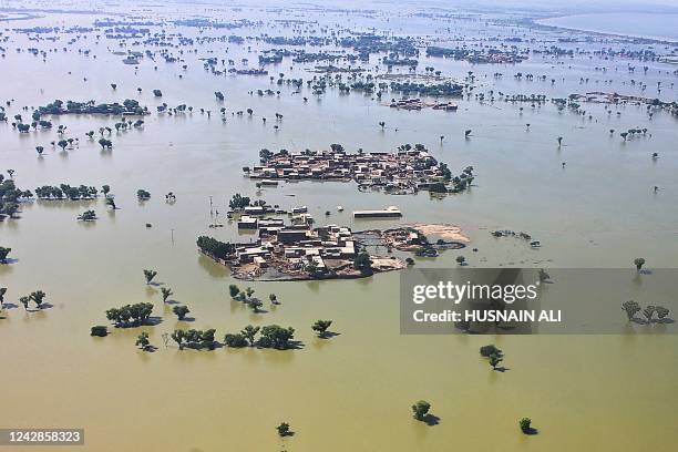 This aerial photograph taken on September 1, 2022 shows a flooded residential area after heavy monsoon rains in Dadu district of Sindh province. -...