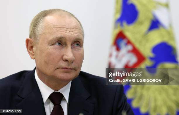 Russian President Vladimir Putin takes part in a ceremony to open five Russian-language secondary schools in Tajikistan with the participation of...