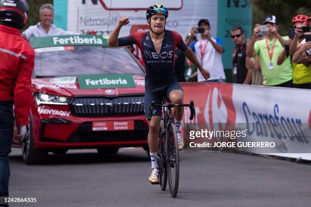 Team Ineos' Ecuadorian rider Richard Carapaz celebrates as he crosses the finish line in first place during the 12th stage of the 2022 La Vuelta...