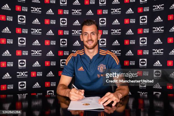 New Manchester United signing Martin Dubravka signs a contract at Carrington Training Ground on September 01, 2022 in Manchester, England.