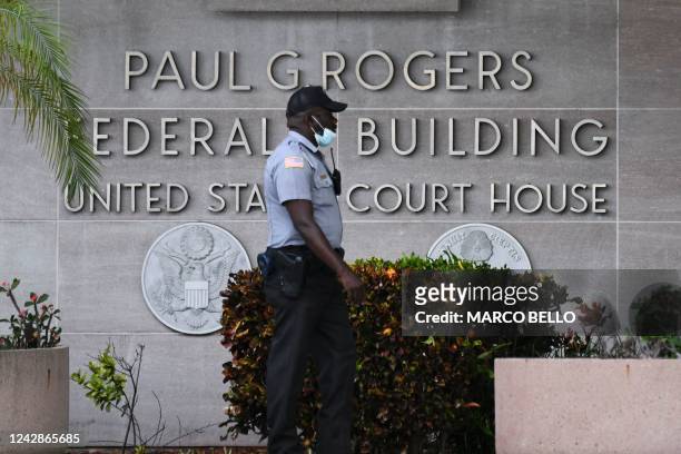 Security officer guards the entrance to the Paul G. Rogers Federal Building and Courthouse in West Palm Beach, Florida, on September 1, 2022. - An...