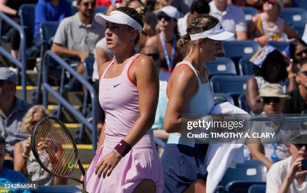 Belarus' Victoria Azarenka plays against Ukraine's Marta Kostyuk during their 2022 US Open Tennis tournament women's singles second round match at...