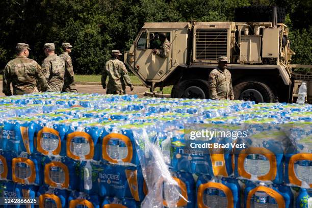 Truck carrying non-potable water, water that can be used for flushing toilets and cleaning but not drinking, arrives at Thomas Cardozo Middle School...